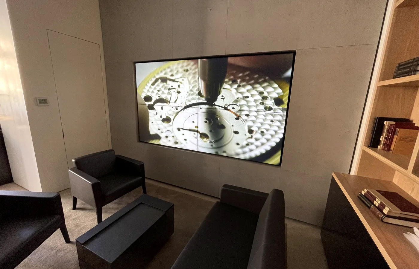 Seating area — screens recessed flush into the wall finish