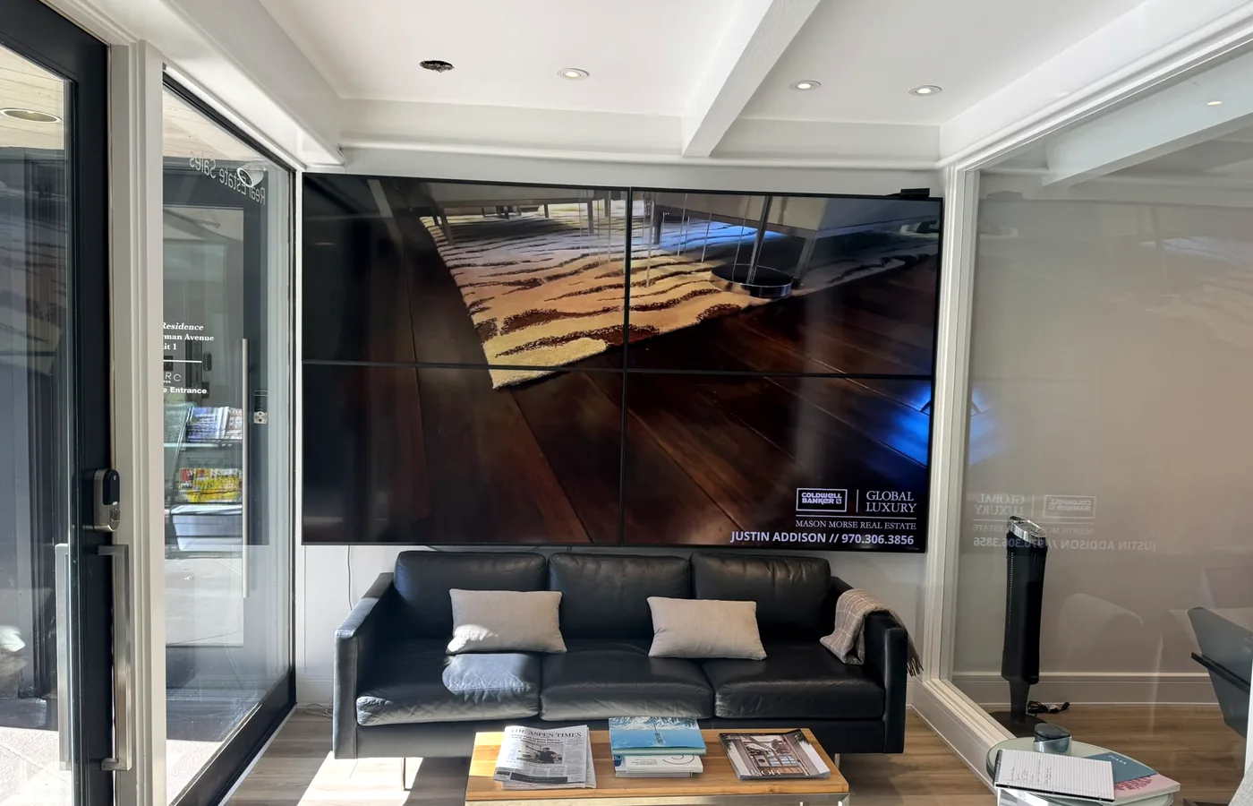 Property content across the full four-screen canvas
