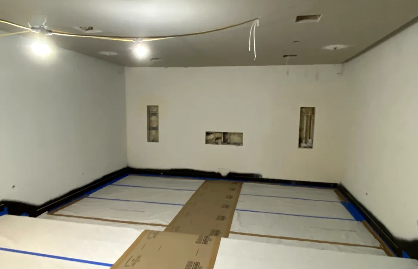 Room shell taken back to studs before rebuild