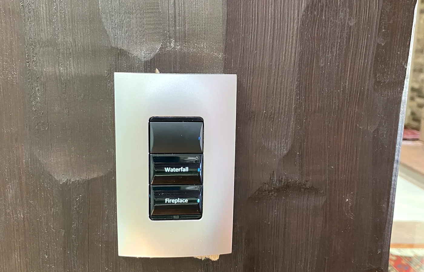 Waterfall and fireplace on a keypad, alongside the lighting