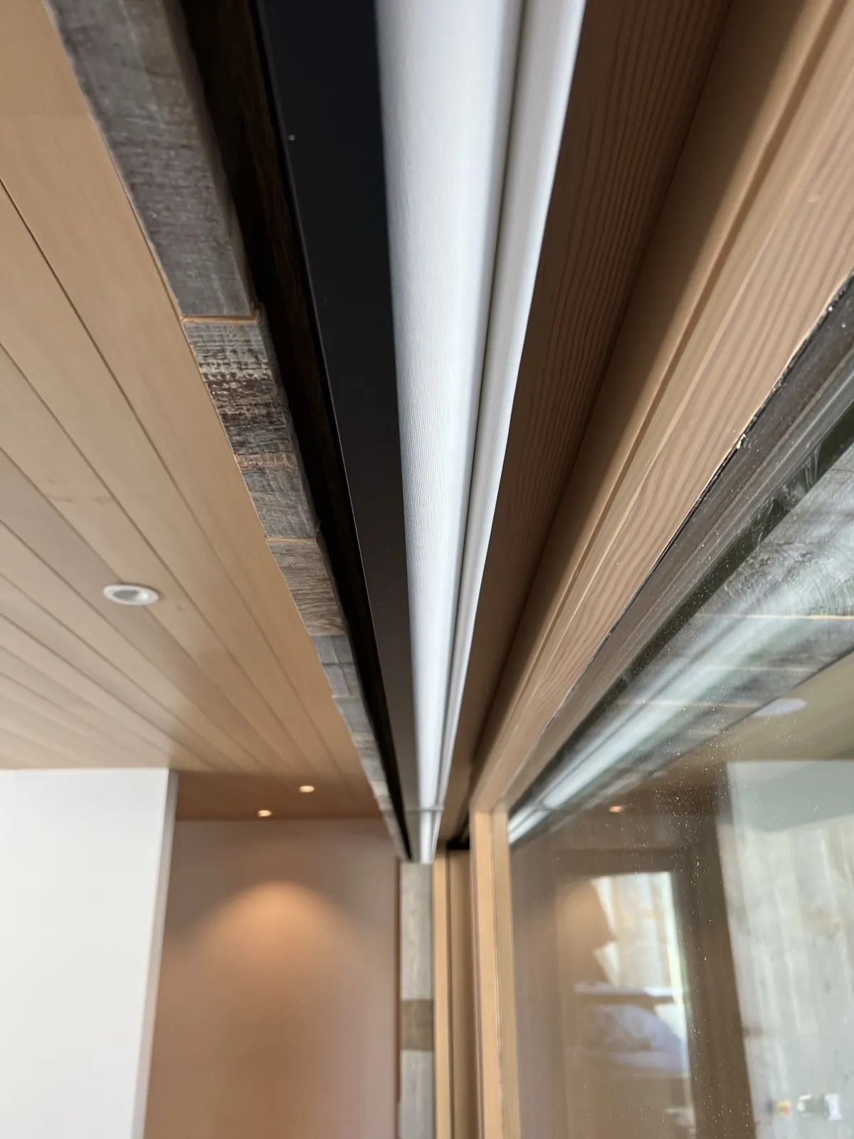 Pocket detail: the fabric roll sits flush in the ceiling